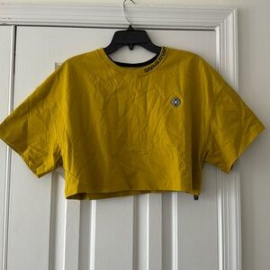 FENTY SavageX HEAVY JERSEY BACK PAGE CROPPED TEE in Sweet Olive Yellow size XL.